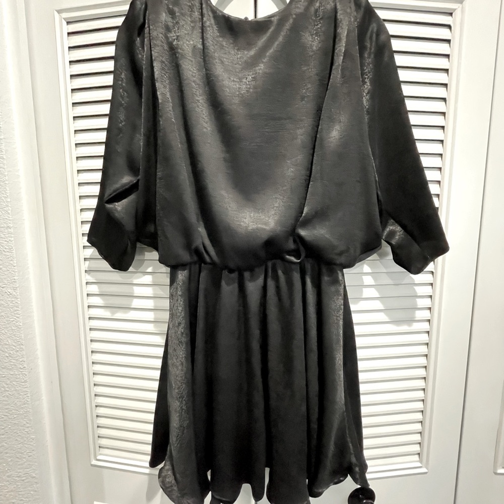 Satin draped minidress with shoulder pads and cinched waist